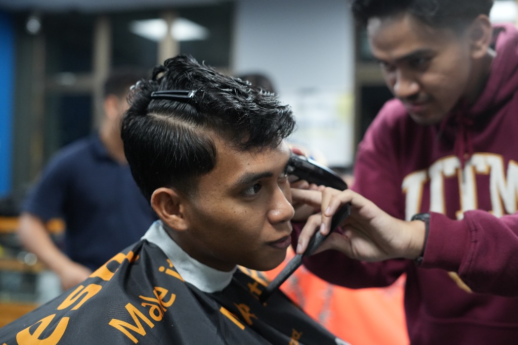 A haircut in progress at Lot 5